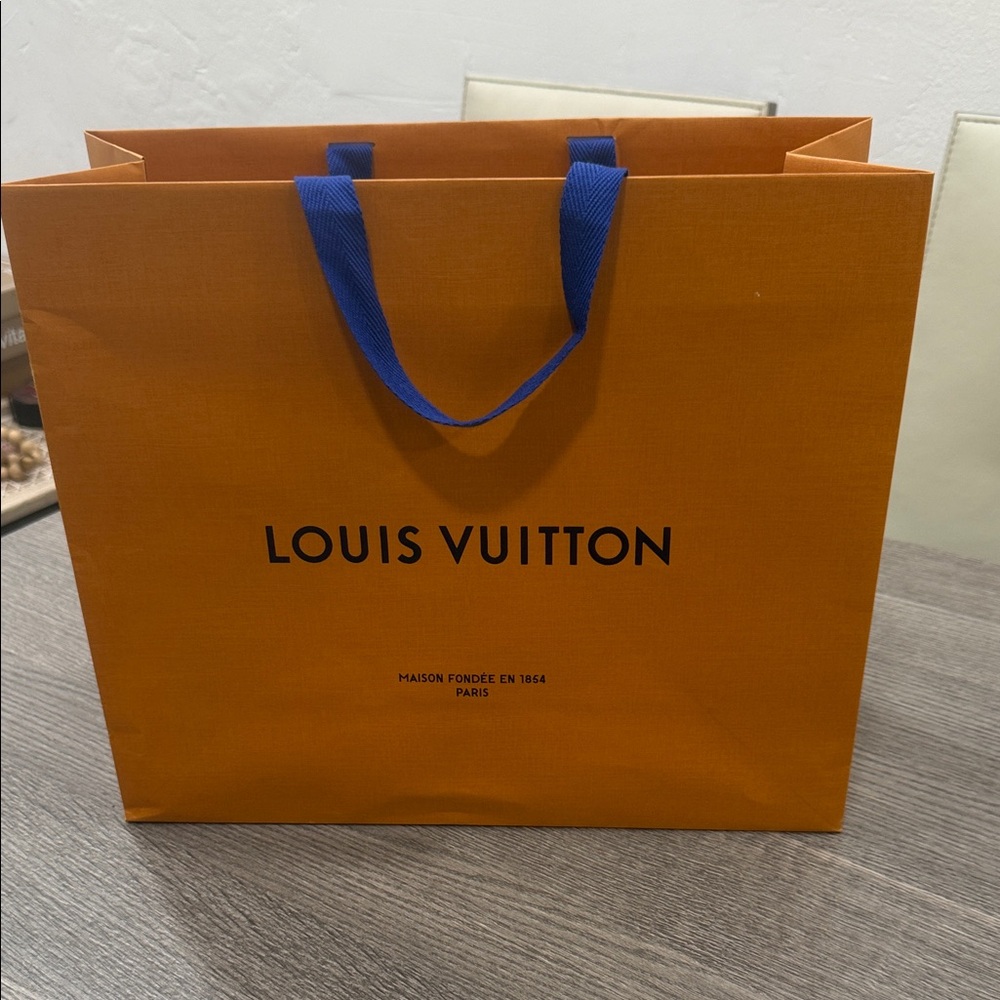 Louis Vuitton Bold Orange Bag with Blue Handles